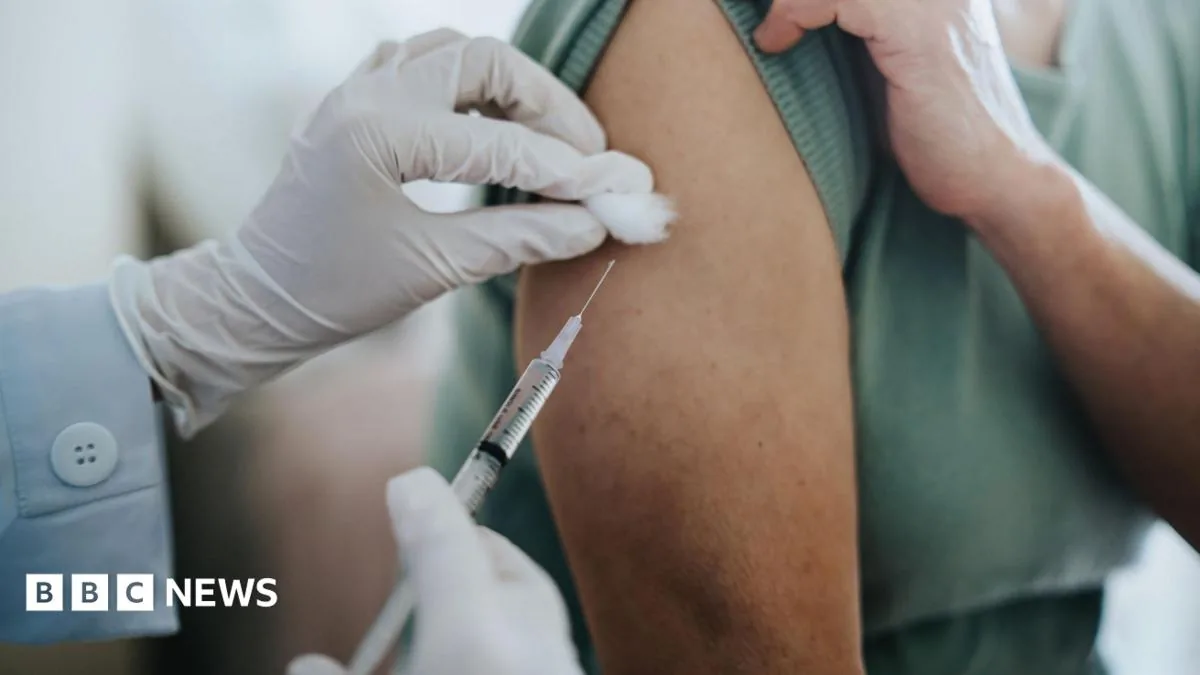 A laboratory vial and syringe representing a personalised cancer vaccine trial